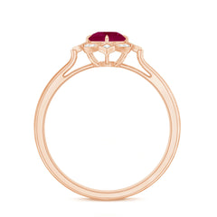 Vintage Style 0.6 Carat Ruby Engagement Ring with Diamond Halo