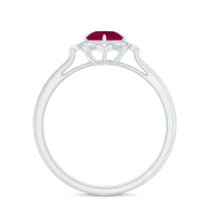 Vintage Style 0.6 Carat Ruby Engagement Ring with Diamond Halo