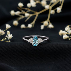 1 Carat Aquamarine Pear Engagement Ring with Diamond Trio