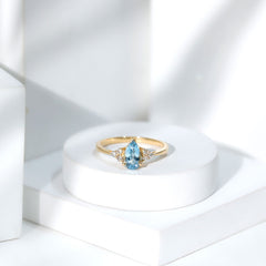 1 Carat Aquamarine Pear Engagement Ring with Diamond Trio