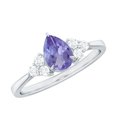 Pear Shaped Tanzanite Solitaire Ring with Diamond Trio