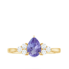 Pear Shaped Tanzanite Solitaire Ring with Diamond Trio