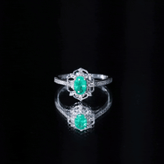 Vintage Style Emerald and Diamond Oval Engagement Ring