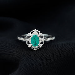 Vintage Style Emerald and Diamond Oval Engagement Ring