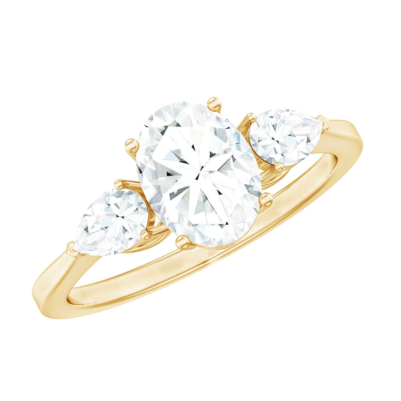 Oval and Pear Cut Moissanite Three Stone Engagement Ring