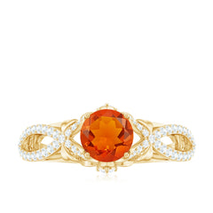1 CT Fire Opal Crossover Engagement Ring with Diamond