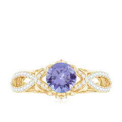 Designer Tanzanite Engagement Ring with Diamond Crossover Shank