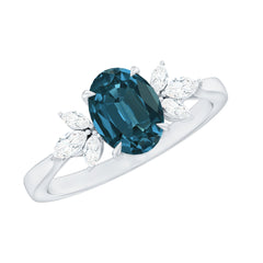 Oval Cut London Blue Topaz Engagement Ring with Diamond Trio