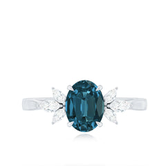 Oval Cut London Blue Topaz Engagement Ring with Diamond Trio
