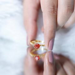 0.75 Carat Round Fire Opal Solitaire Ring in Lotus Basket Setting