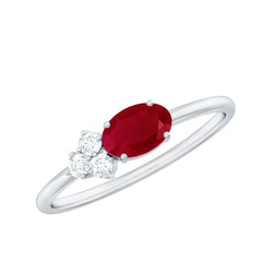 East West Style 0.6 Carat Oval Ruby Promise Ring with Diamond Trio