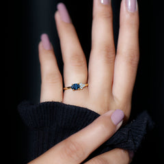 4X6mm Oval Cut London Blue Topaz East West Promise Ring with Diamond Trio