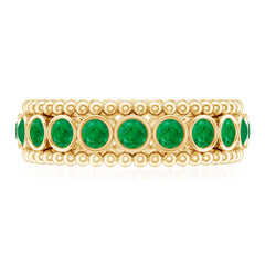 Vintage Inspired Emerald Wedding Band in Bezel Setting