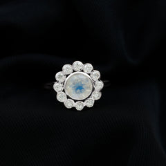 Round Moonstone and Diamond Halo Engagement Ring in Bezel Setting