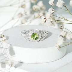 Vintage Inspired 0.5 Carat Peridot Engagement Ring with Diamond Halo