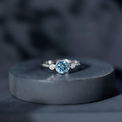 Bezel Set Aquamarine Solitaire Engagement Ring with Diamond