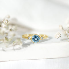 Bezel Set Aquamarine Solitaire Engagement Ring with Diamond