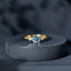 Bezel Set Aquamarine Solitaire Engagement Ring with Diamond