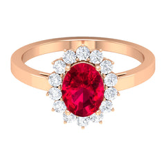 Natural 0.6 Carat Ruby Oval Engagement Ring with Diamond Halo