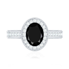 Vintage Inspired Black Onyx Oval Engagement Ring with Diamond Halo