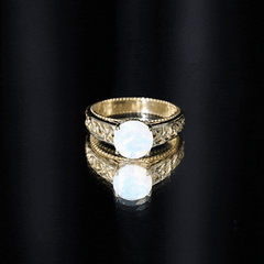 Ethiopian Opal Celtic Knot Engagement Ring with Surprise Diamond