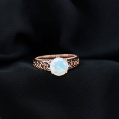 Ethiopian Opal Celtic Knot Engagement Ring with Surprise Diamond