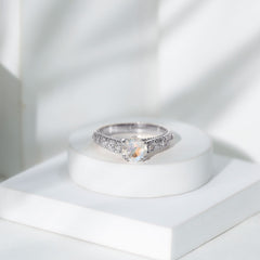Vintage Style Moonstone and Diamond Flower Engagement Ring