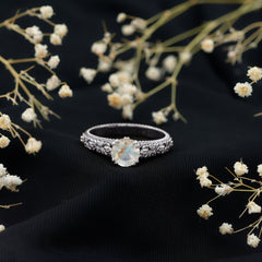Vintage Style Moonstone and Diamond Flower Engagement Ring
