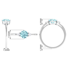 1 CT Aquamarine and Diamond Three Stone Minimal Ring