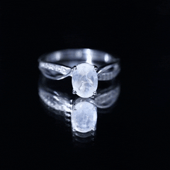 Oval Moonstone Infinity Engagement Ring with Diamond