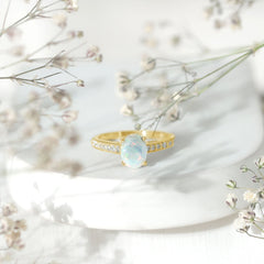 Natural 6X8mm Ethiopian Opal Oval Engagement Ring with Diamond Side Stones