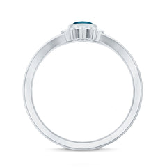 4X8mm Marquise Cut London Blue Topaz Cocktail Ring with Diamond