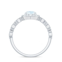 Vintage Style Moonstone Engagement Ring with Diamond Accent