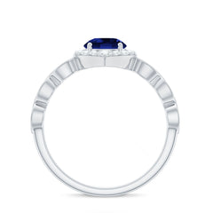 Vintage Inspired 1 Carat Lab Grown Blue Sapphire Engagement Ring with Diamond Halo