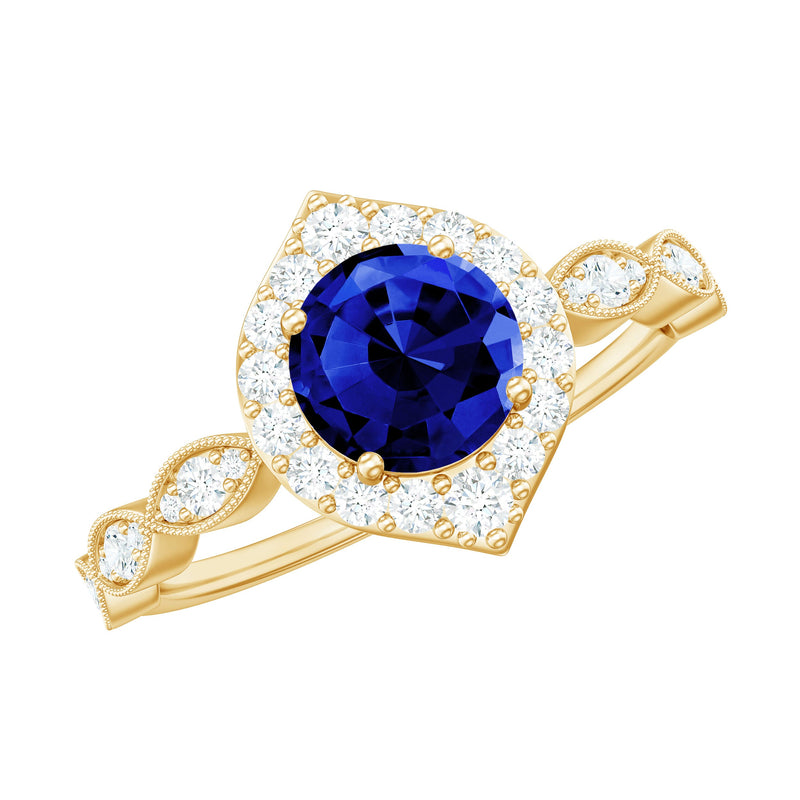 Vintage Inspired 1 Carat Lab Grown Blue Sapphire Engagement Ring with Diamond Halo