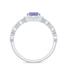 Real 0.54 Carat Tanzanite Vintage Engagement Ring with Diamond