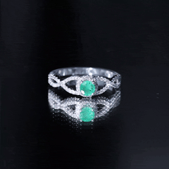 Real Emerald and Diamond Criss Cross Engagement Ring