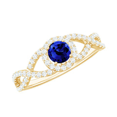 Certified 0.6 Carat Lab Grown Blue Sapphire Crossover Engagement Ring with Moissanite