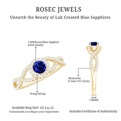 Certified 0.6 Carat Lab Grown Blue Sapphire Crossover Engagement Ring with Moissanite