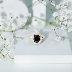 Oval Lab Grown Black Diamond and Moissanite Halo Engagement Ring