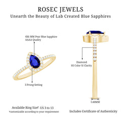 Certified Half Carat Lab Grown Blue Sapphire Teardrop Engagement Ring with Diamond Halo
