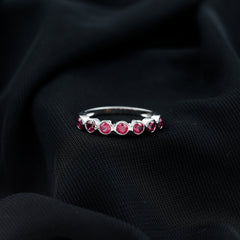 Minimal Created Ruby Half Eternity Ring in Bezel Setting