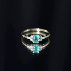 Emerald Cut Emerald Engagement Ring with Diamond Trio