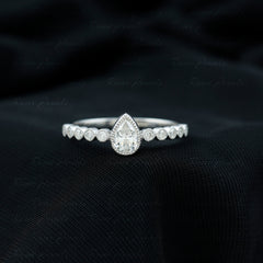 Beaded Bezel Set Moissanite Pear Engagement Ring