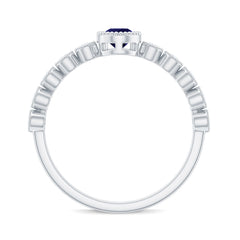 Pear Cut Blue Sapphire Solitaire Ring with Diamond Accent