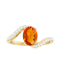Oval Cut Solitaire Fire Opal and Diamond Bypass Ring