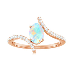 Natural Ethiopian Opal Oval Engagement Ring with Diamond Bypass Shank