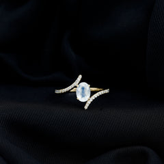 Oval Moonstone and Diamond Bypass Engagement Ring
