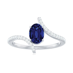 5X7 mm Oval Cut Lab Created Blue Sapphire Bypass Solitaire Ring with Diamond