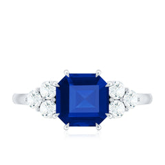 Certified 4.8 Carat Asscher Cut Lab Grown Blue Sapphire Engagement Ring with Diamond Trio